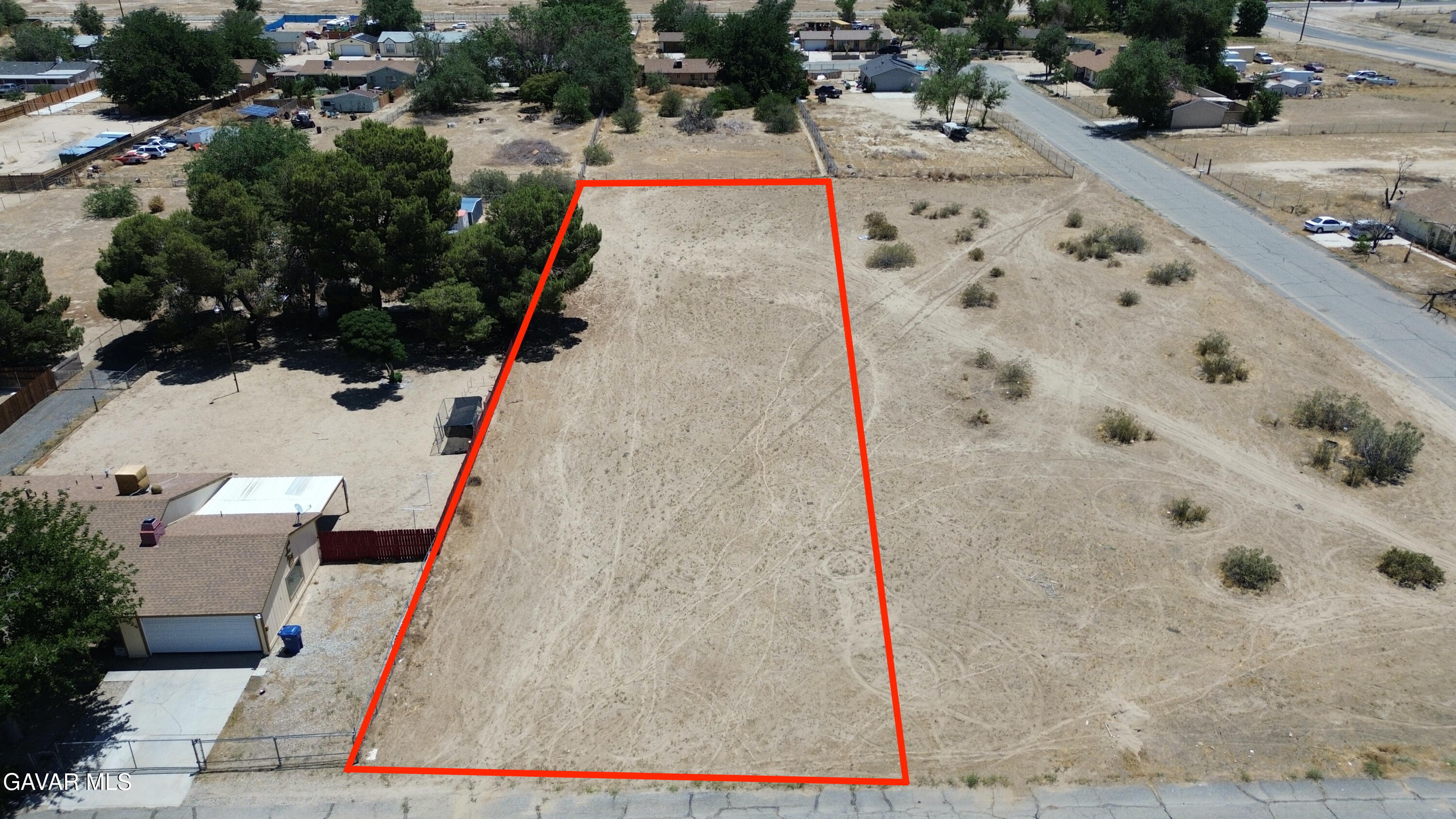 178th Street East Lancaster, CA 93535 - Photo 4 of 11 an aerial view of a wooden house with a yard