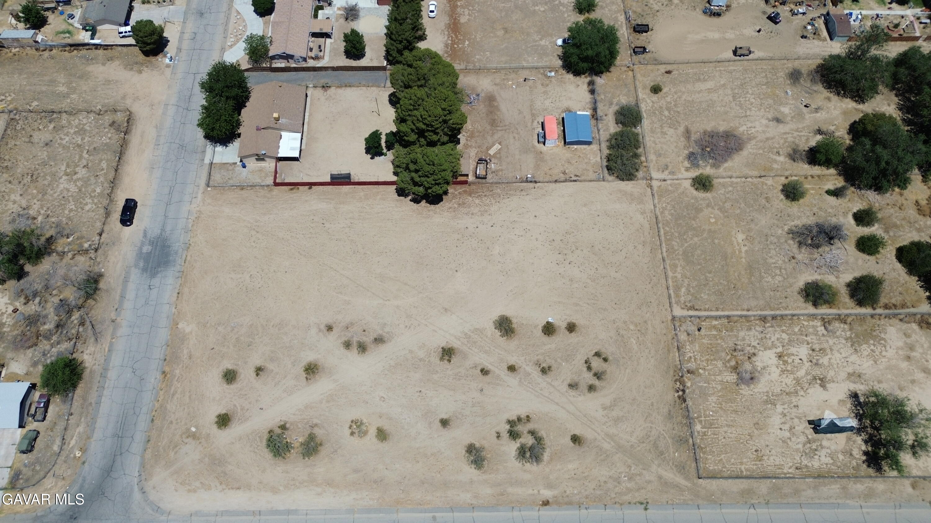 178th Street East Lancaster, CA 93535 - Photo 9 of 11 an aerial view of a house with a yard and seating space