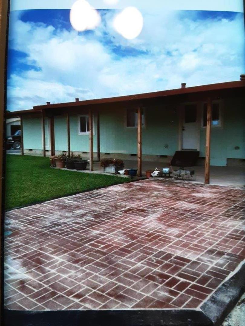 1738 H Santa Ana Road, Unit H Hollister, CA 95023 - Photo 2 of 33 a view of a wooden house with a yard