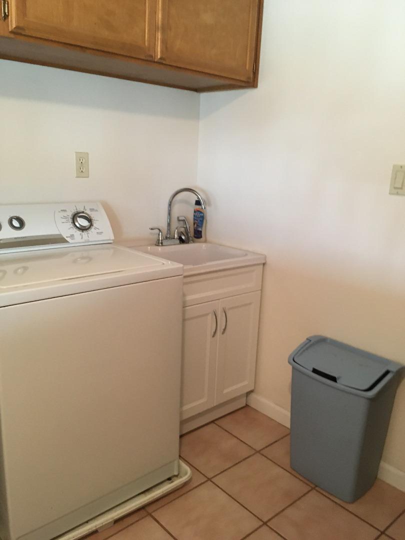 1738 H Santa Ana Road, Unit H Hollister, CA 95023 - Photo 21 of 33 a utility room with dryer and washer