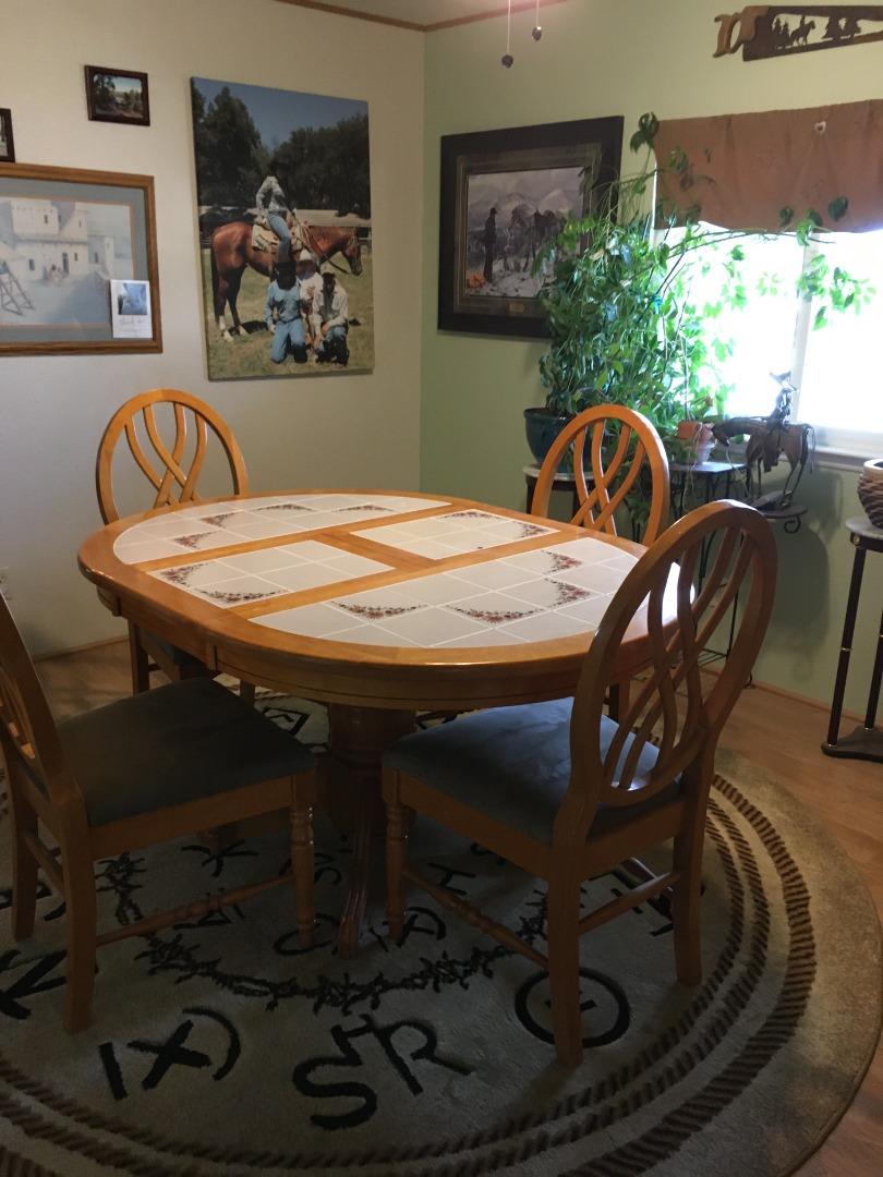 1738 H Santa Ana Road, Unit H Hollister, CA 95023 - Photo 22 of 33 a view of a dining room with furniture window and wooden floor