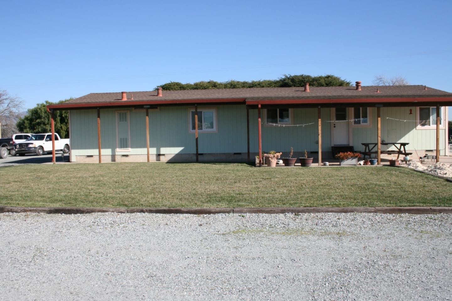 1738 H Santa Ana Road, Unit H Hollister, CA 95023 - Photo 7 of 33 a front view of a house with a yard