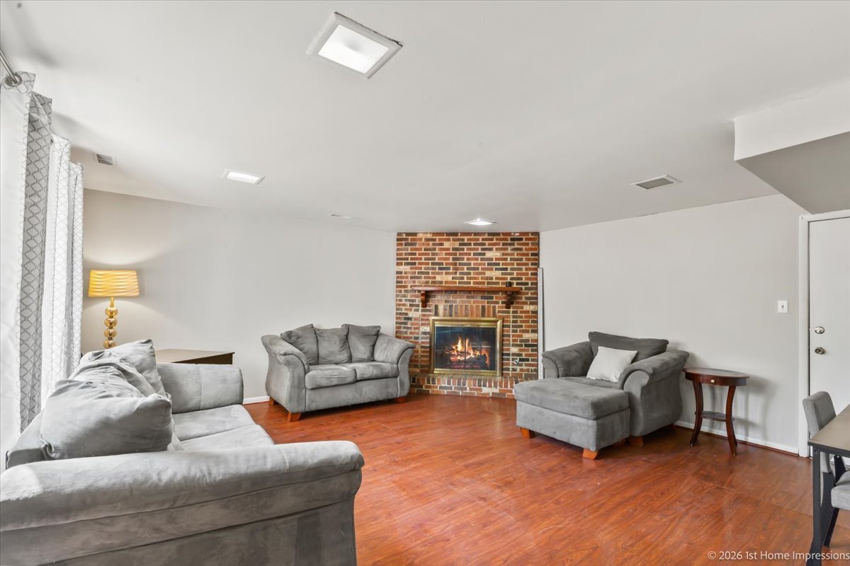 18847 May Avenue Homewood, IL 60430 - Photo 18 of 26 a living room with furniture and a couch
