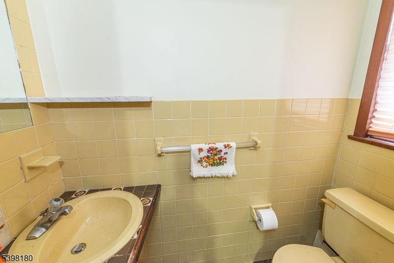 24 Wehrli Road Long Valley, NJ 07853 - Photo 11 of 16 a bathroom with a sink and a mirror