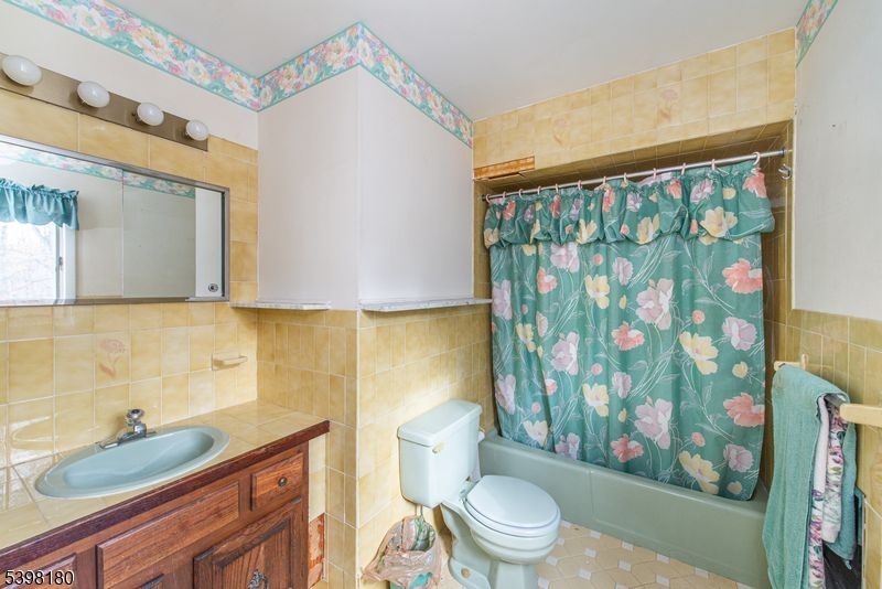 24 Wehrli Road Long Valley, NJ 07853 - Photo 7 of 16 a bathroom with a granite countertop sink mirror vanity and toilet