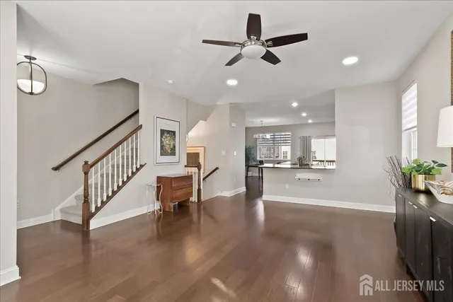a view of an entryway and livingroom with furniture