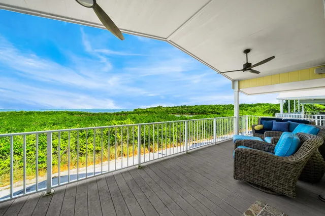 a balcony with furniture