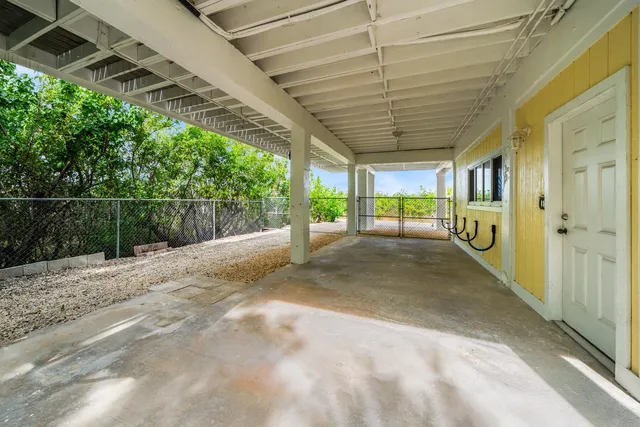 an aerial view of residential house with outdoor space