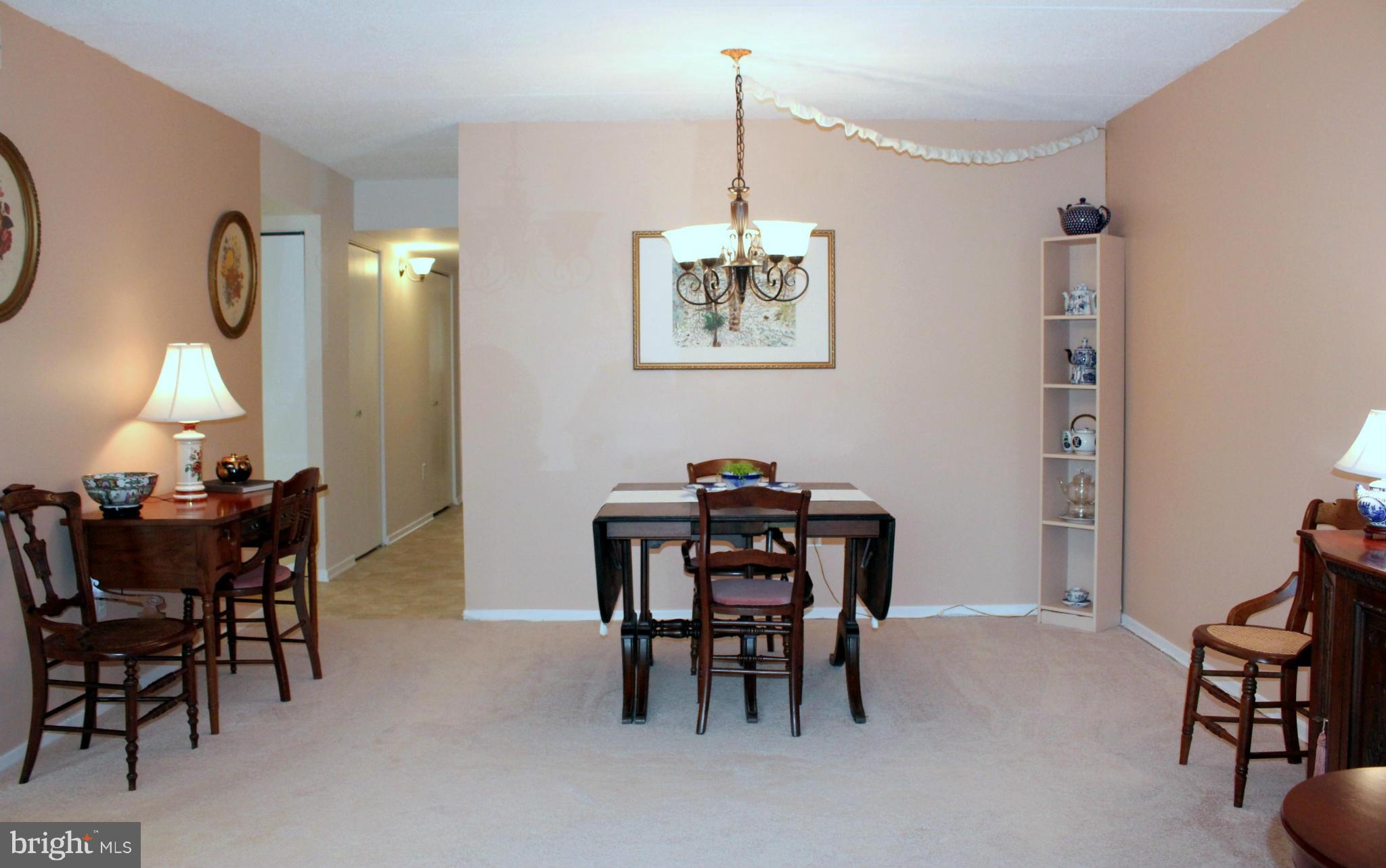 5643 Harpers Farm Road, Unit A Columbia, MD 21044 - Photo 12 of 25 a view of a dining room with furniture