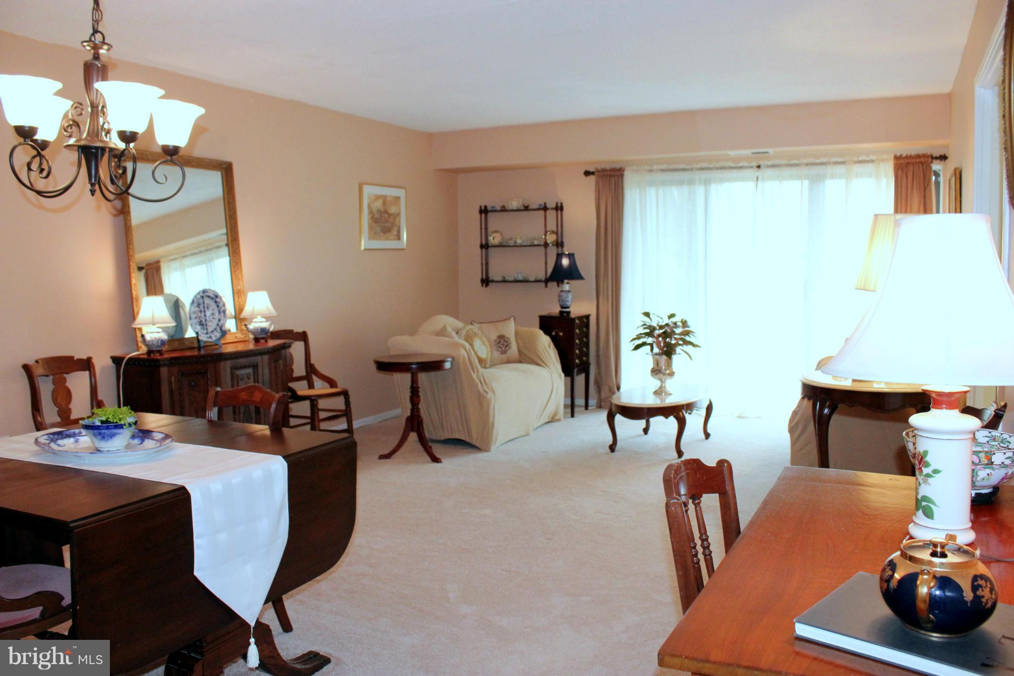 5643 Harpers Farm Road, Unit A Columbia, MD 21044 - Photo 14 of 25 a dining room with furniture and window