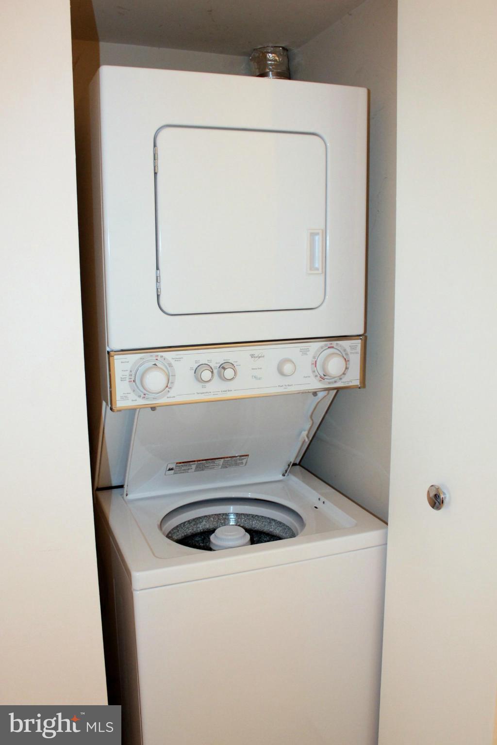 5643 Harpers Farm Road, Unit A Columbia, MD 21044 - Photo 22 of 25 a utility room with dryer and washer