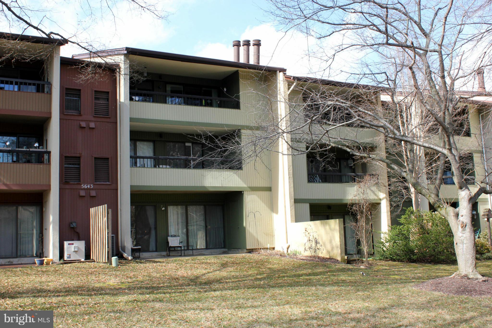 5643 Harpers Farm Road, Unit A Columbia, MD 21044 - Photo 24 of 25 a view of a building with a outdoor space