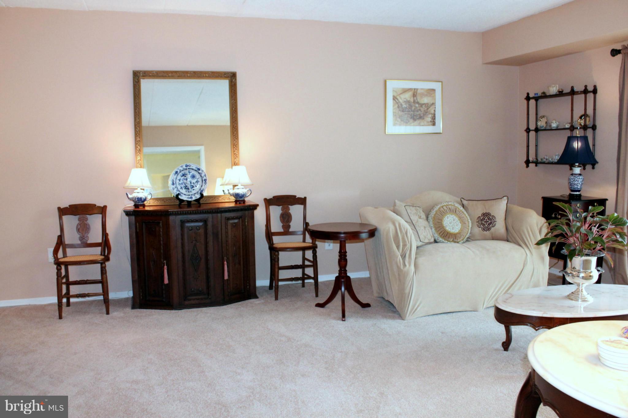 5643 Harpers Farm Road, Unit A Columbia, MD 21044 - Photo 10 of 25 a dining room with furniture and window