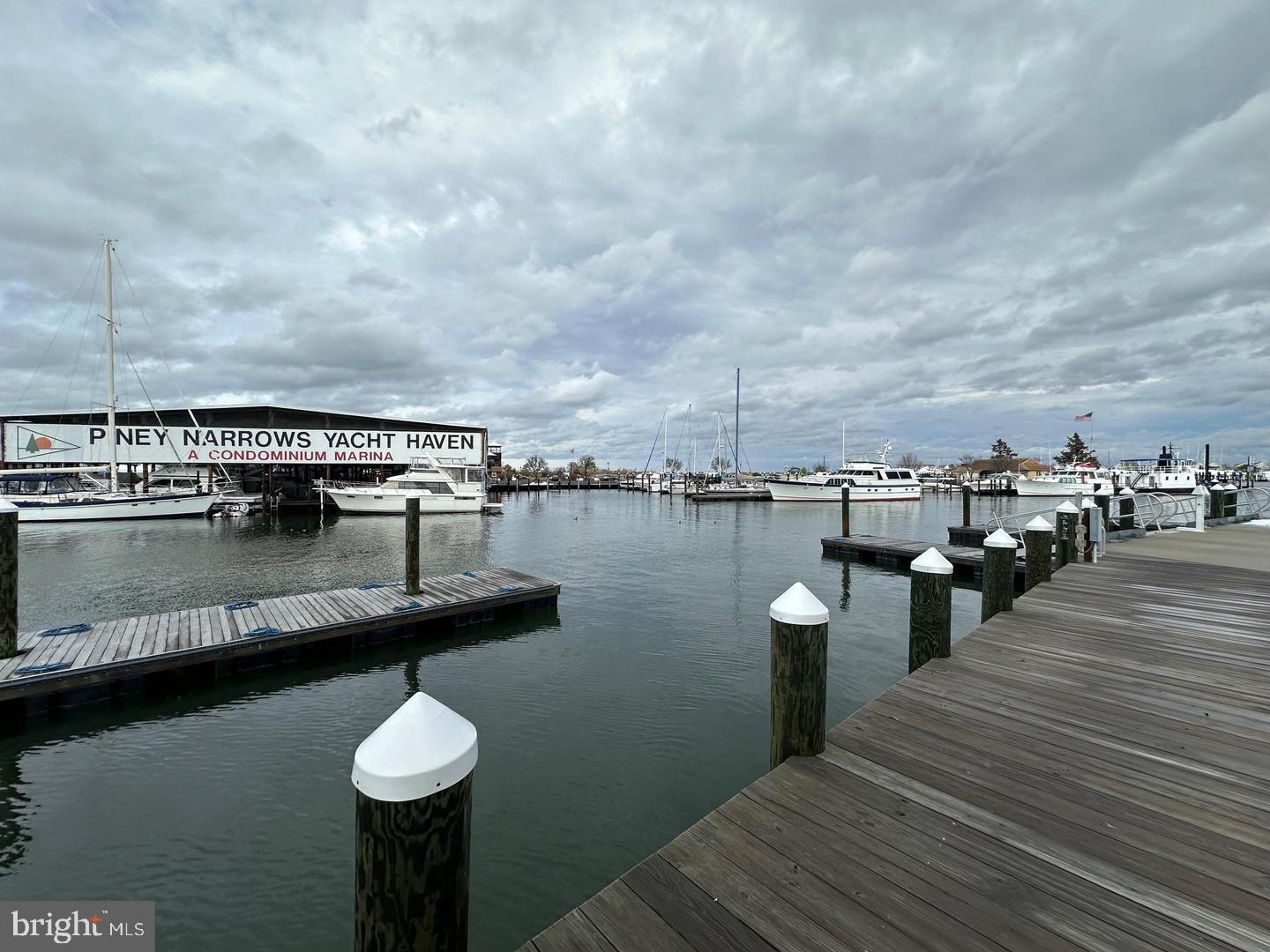 5 Piney Narrows Road Chester, MD 21619 - Photo 11 of 22 a view of a lake with sitting area