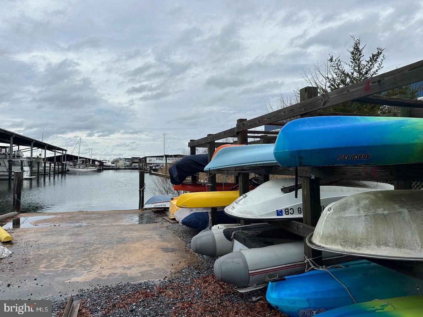 5 Piney Narrows Road Chester, MD 21619 - Photo 15 of 22 a view of a swimming pool with a chairs