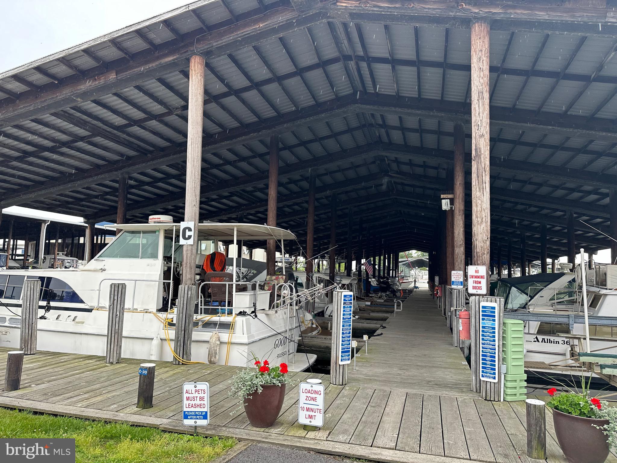 5 Piney Narrows Road Chester, MD 21619 - Photo 18 of 22 a roof deck view with glass windows and plants