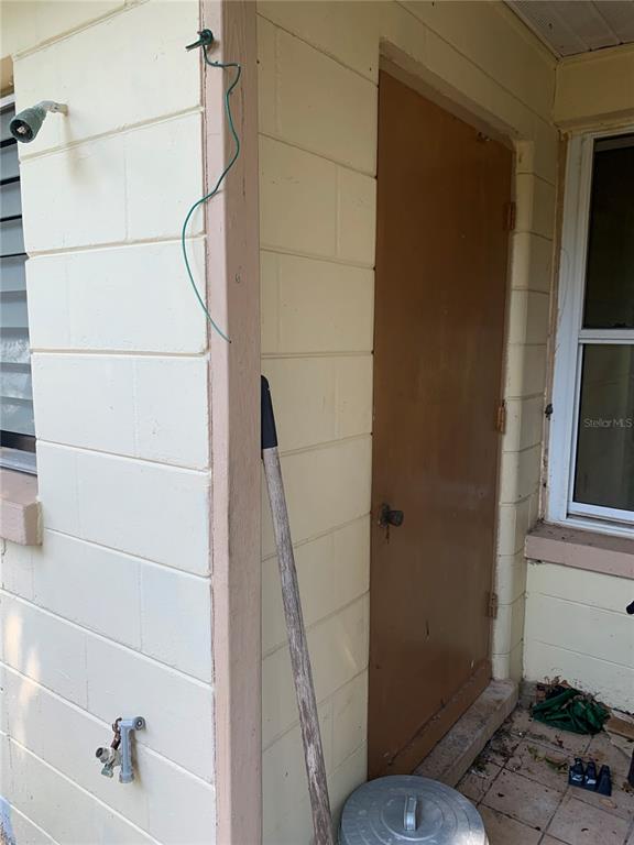 619 Coronado Road Venice, FL 34293 - Photo 10 of 13 DOOR TO LAUNDRY ROOM/WORK ROOM