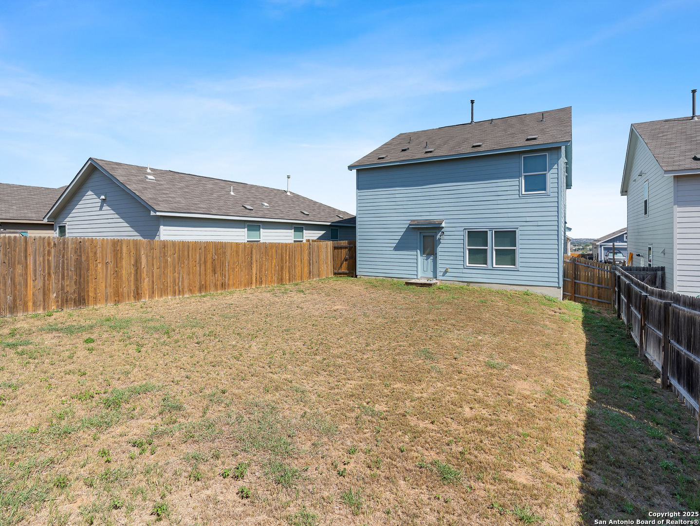8842 Barrow Path Converse, TX 78109 - Photo 33 of 36 a front view of a house with a yard
