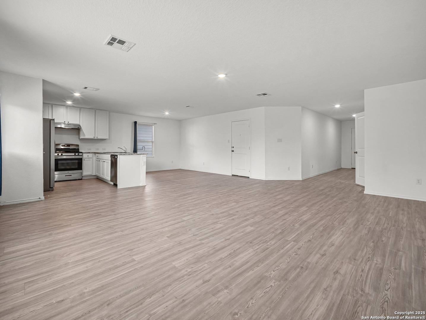 8842 Barrow Path Converse, TX 78109 - Photo 9 of 36 a view of kitchen with wooden floor