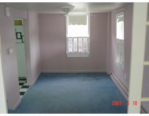 5 South Webster Street Haverhill, MA 01835 - Photo 4 of 8 a view of an empty room with a window