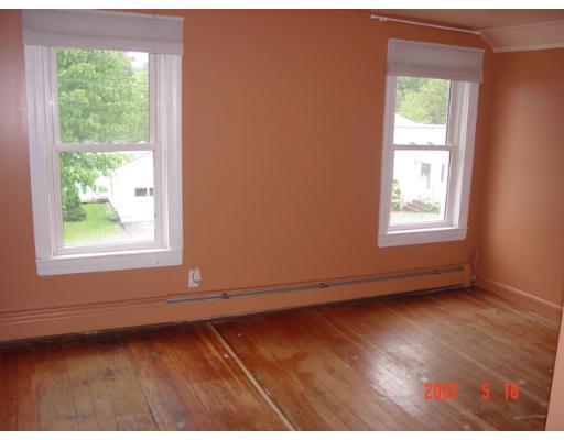 5 South Webster Street Haverhill, MA 01835 - Photo 6 of 8 an empty room with wooden floor and windows