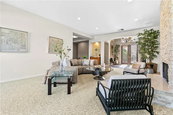 a kitchen with stainless steel appliances granite countertop a refrigerator sink and cabinets