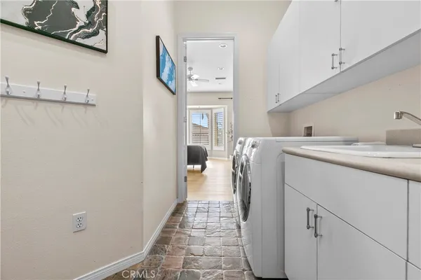 a workspace with furniture and a window