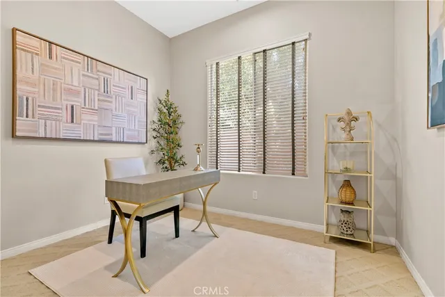a view of a backyard with fountain and plants