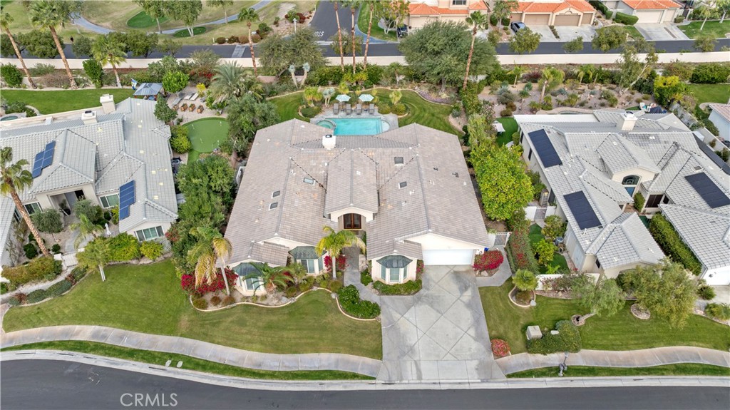 44 Killian Way Rancho Mirage, CA 92270 - Photo 70 of 72 an aerial view of a house with a yard and lake view