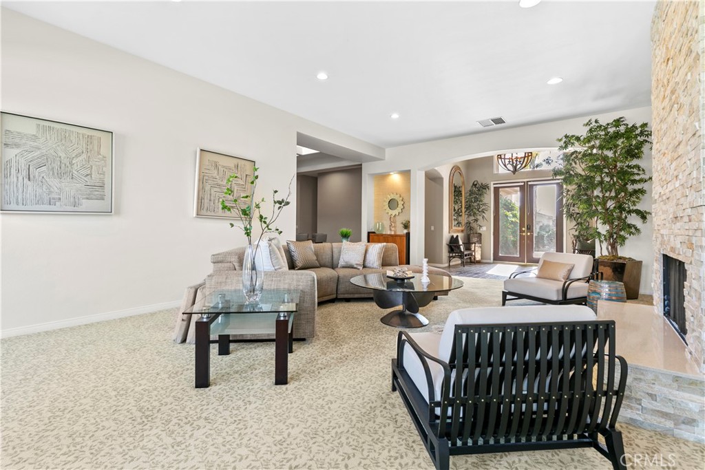 44 Killian Way Rancho Mirage, CA 92270 - Photo 10 of 72 a living room with furniture and a large window
