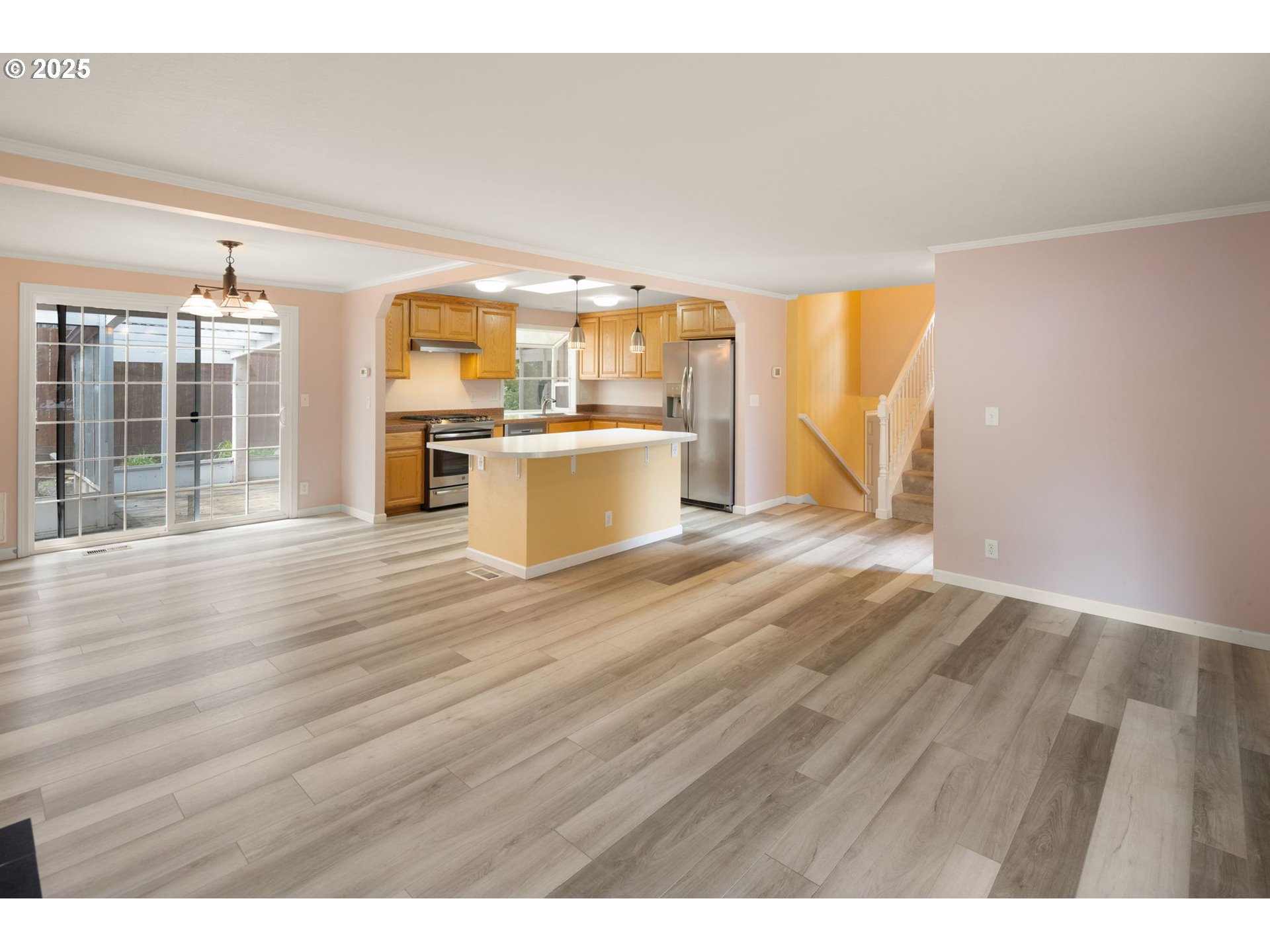 2730 Malibu Way Eugene, OR 97405 - Photo 19 of 47 a view of a kitchen with wooden floor and a kitchen