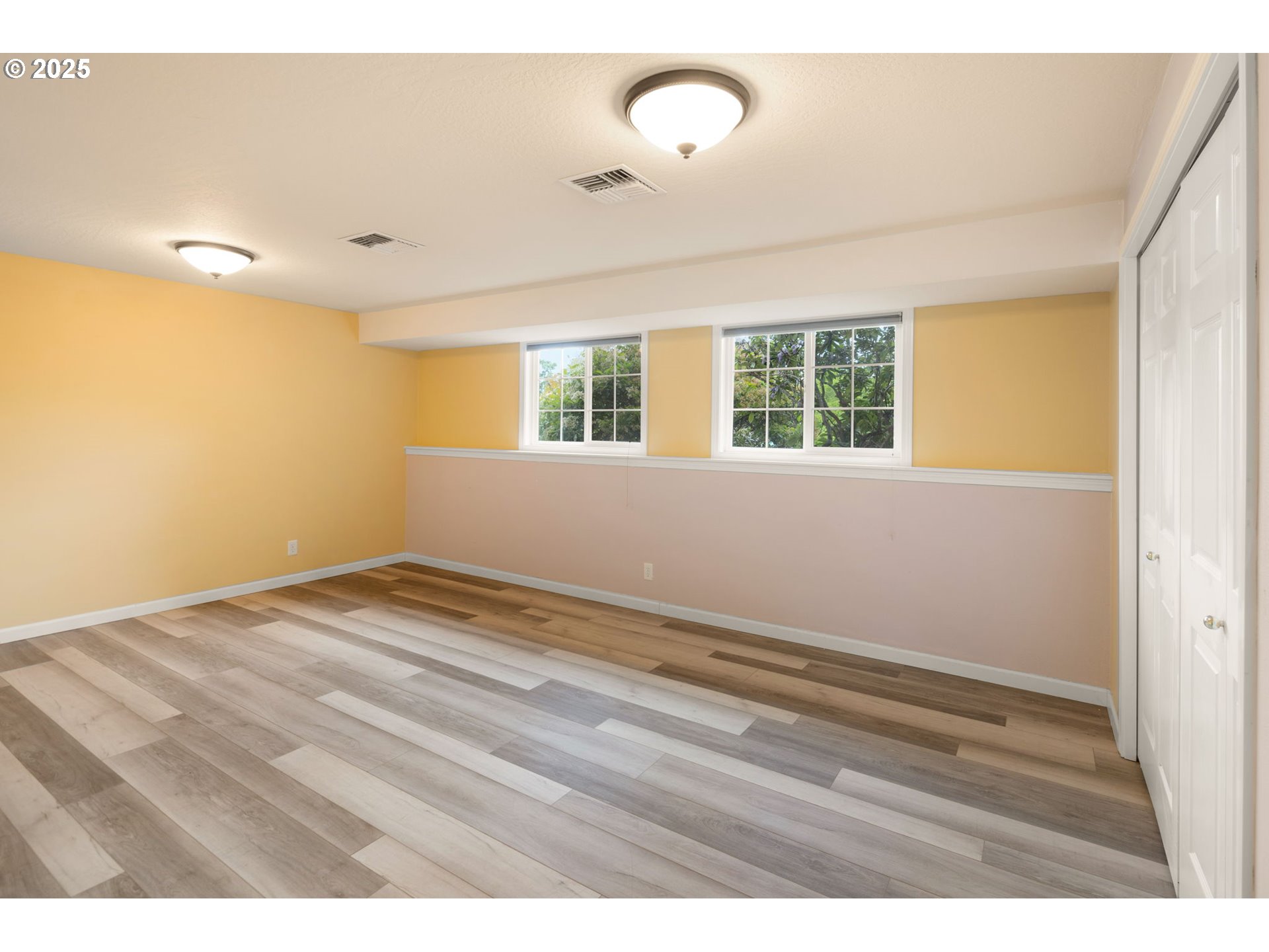2730 Malibu Way Eugene, OR 97405 - Photo 31 of 47 a view of empty room with wooden floor and fan