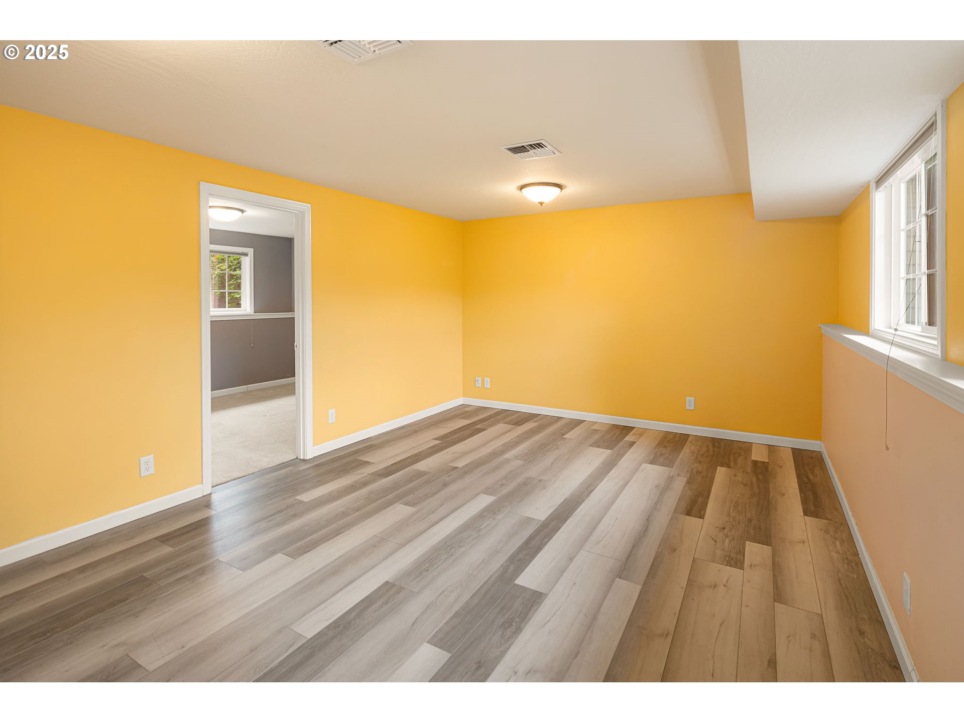 2730 Malibu Way Eugene, OR 97405 - Photo 33 of 47 a view of an empty room and wooden floor