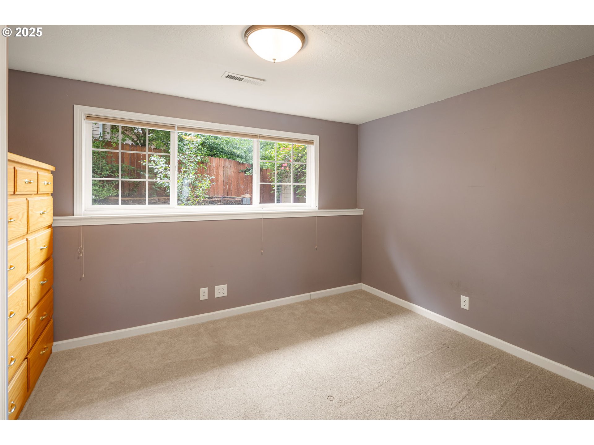 2730 Malibu Way Eugene, OR 97405 - Photo 34 of 47 an empty room with wooden floor and windows