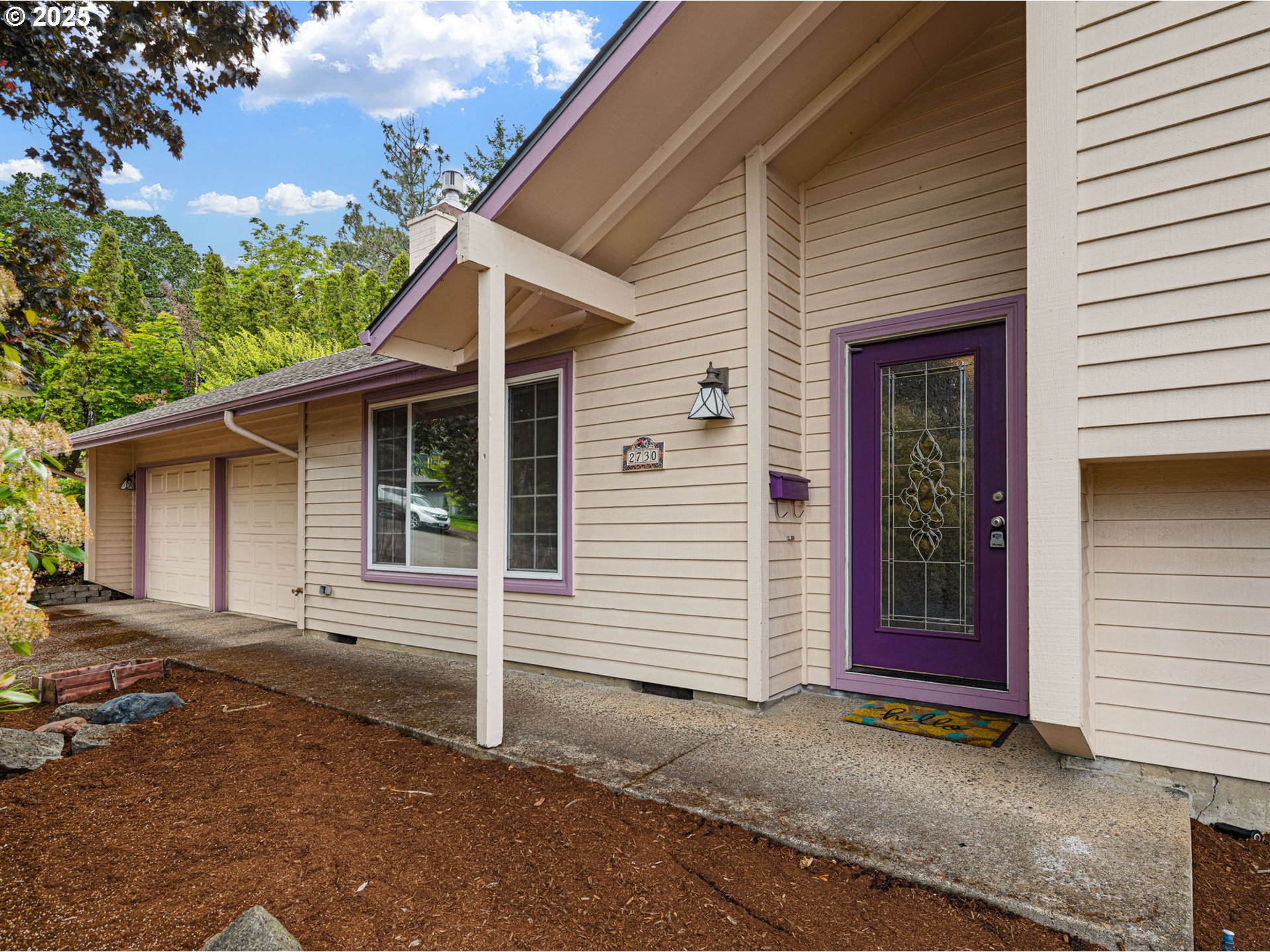 2730 Malibu Way Eugene, OR 97405 - Photo 6 of 47 a view of a house with a garage