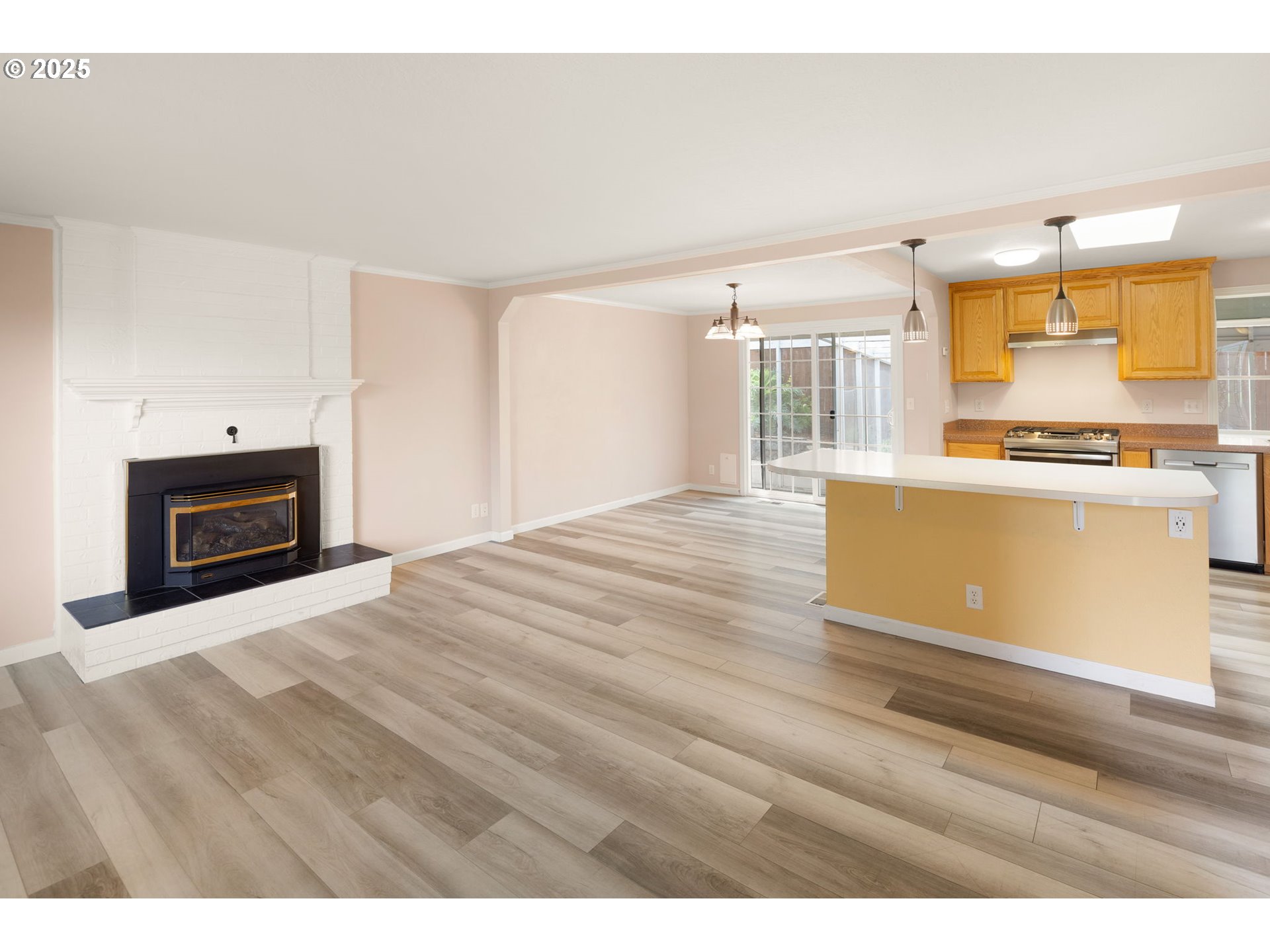 2730 Malibu Way Eugene, OR 97405 - Photo 9 of 47 a view of kitchen with sink and wooden floor