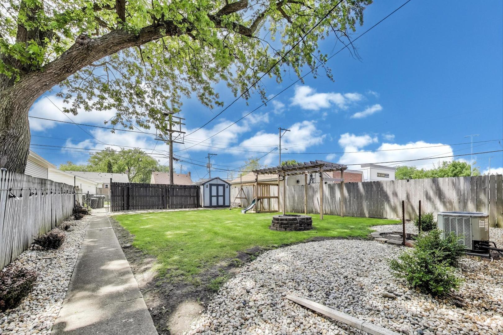 4118 Prairie Avenue Brookfield, IL 60513 - Photo 37 of 43 a view of a backyard with a garden