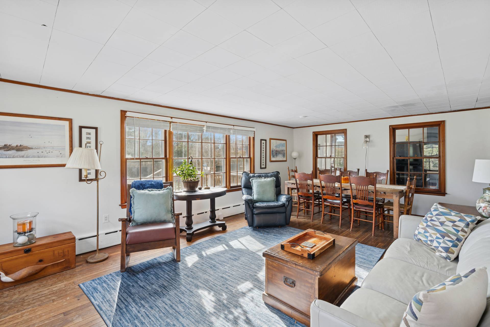 144 Sayre's Path Wainscott, NY 11975 - Photo 3 of 8 a living room with furniture and wooden floor