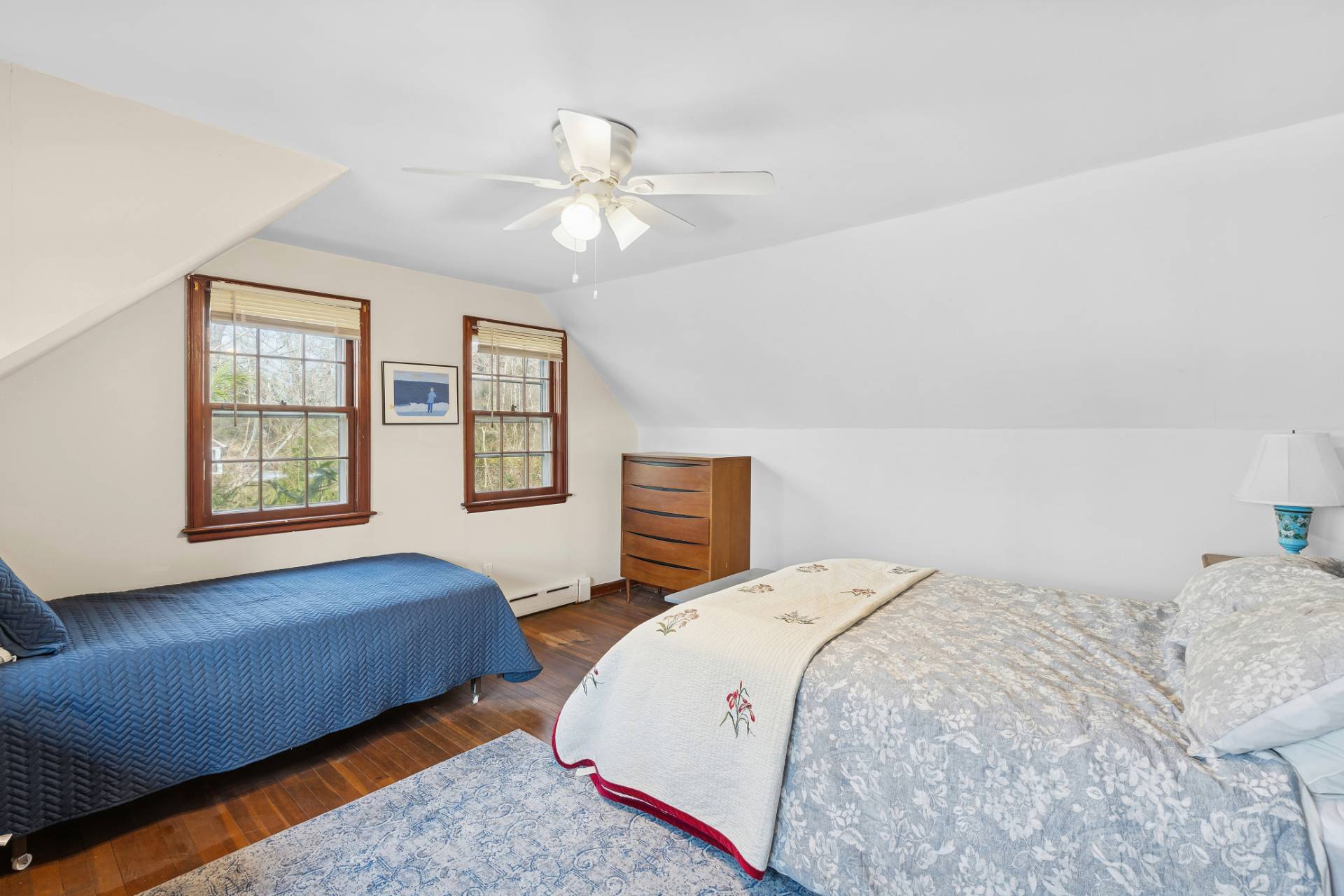 144 Sayre's Path Wainscott, NY 11975 - Photo 6 of 8 a bedroom with two beds and ceiling fan