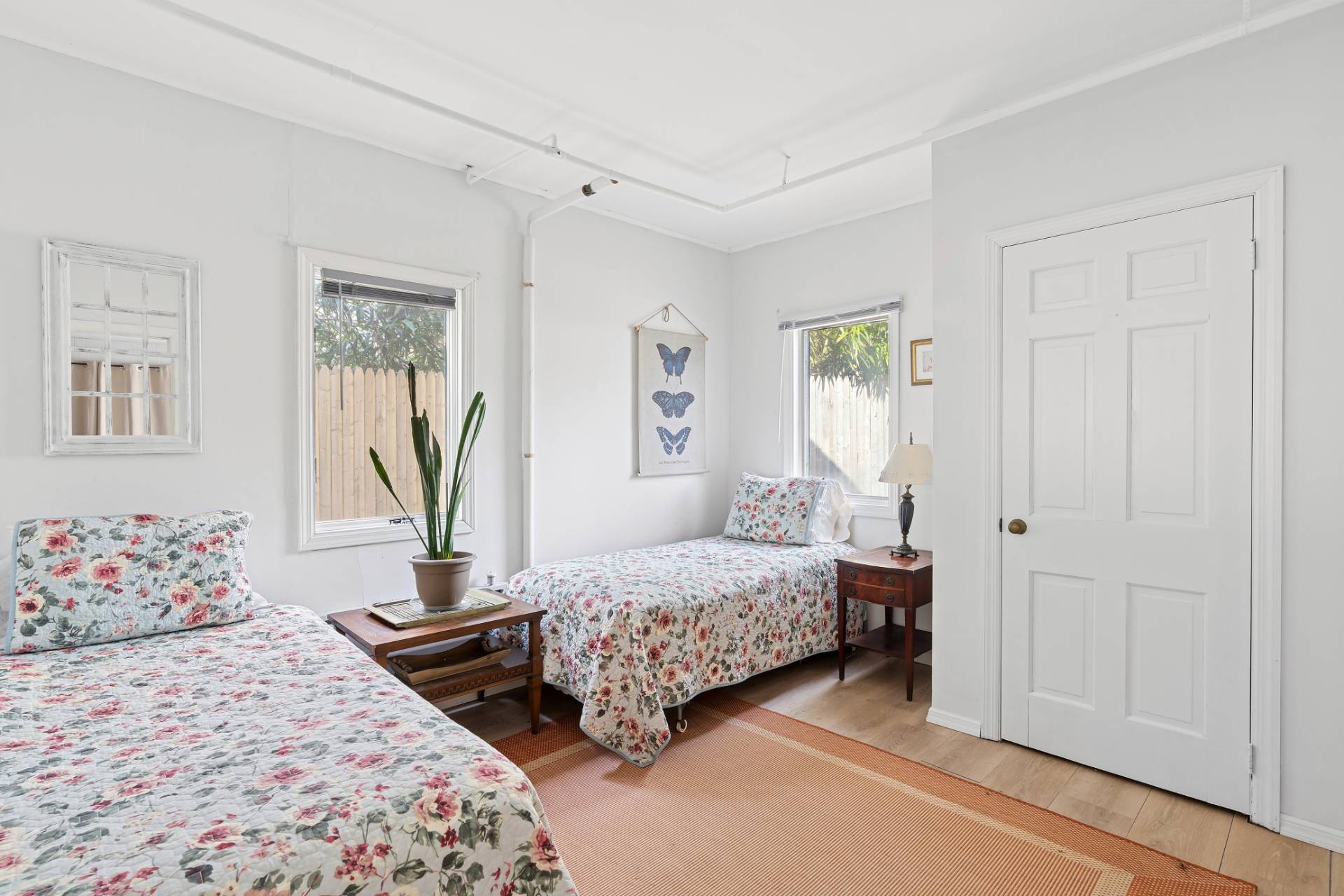 144 Sayre's Path Wainscott, NY 11975 - Photo 8 of 8 a bedroom with a bed and a window