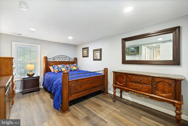 a large kitchen with lots of counter space a sink and appliances