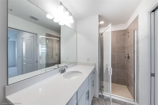 a bathroom with a sink toilet and vanity