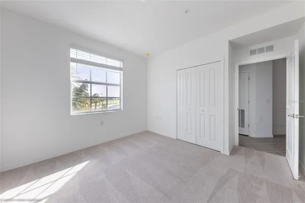 a view of a city with lawn chairs