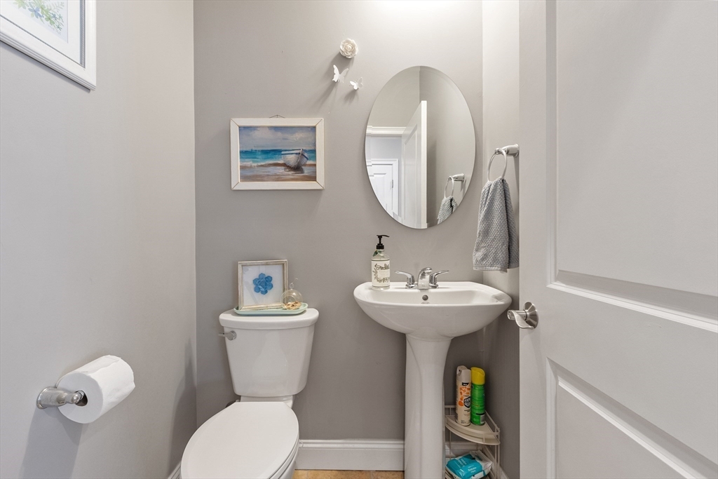 2 Eagle Nest Road, Unit B62 Clinton, MA 01510 - Photo 13 of 35 a bathroom with a toilet a sink and a mirror