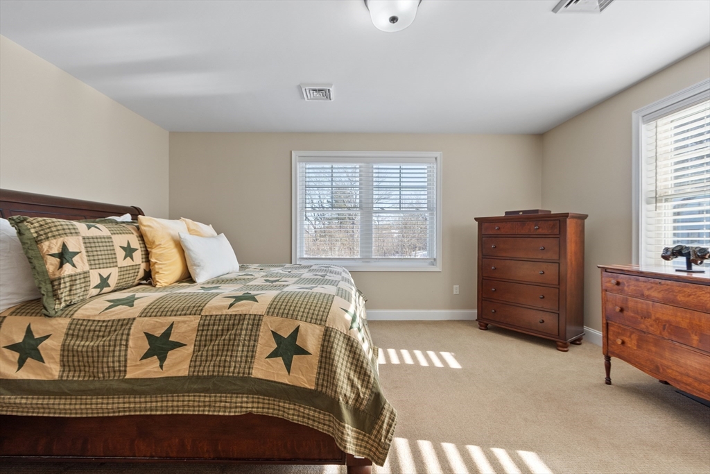 2 Eagle Nest Road, Unit B62 Clinton, MA 01510 - Photo 19 of 35 a bedroom with a bed and a window