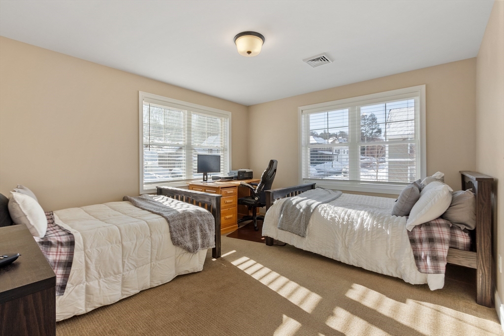2 Eagle Nest Road, Unit B62 Clinton, MA 01510 - Photo 25 of 35 a bedroom with two beds and large window