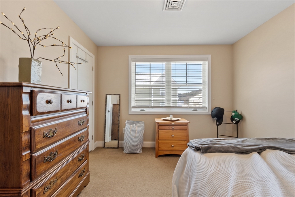2 Eagle Nest Road, Unit B62 Clinton, MA 01510 - Photo 26 of 35 a bedroom with bed and a window