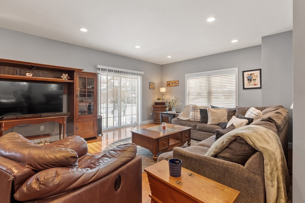 2 Eagle Nest Road, Unit B62 Clinton, MA 01510 - Photo 8 of 35 a living room with furniture and a flat screen tv