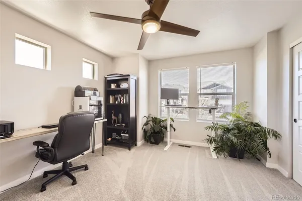 a room with furniture and a window