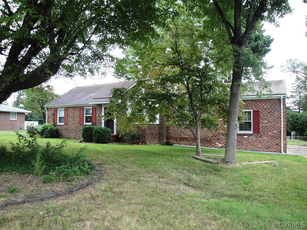 5919 Brookfield Road Richmond, VA 23227 - Photo 1 of 1 a view of a house with a yard